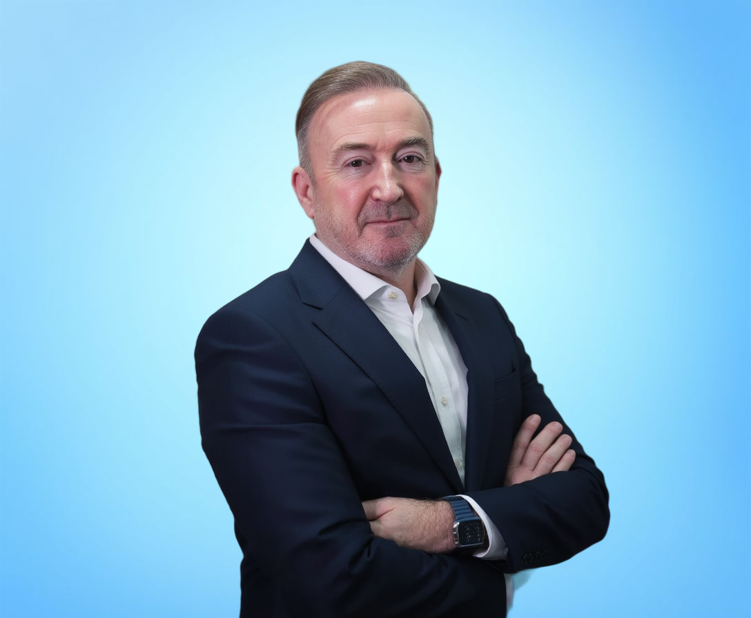 JB Headshot Blue background